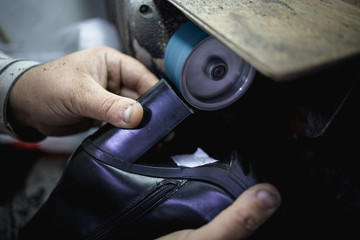 Traditional shoe making in workshop,stock photo