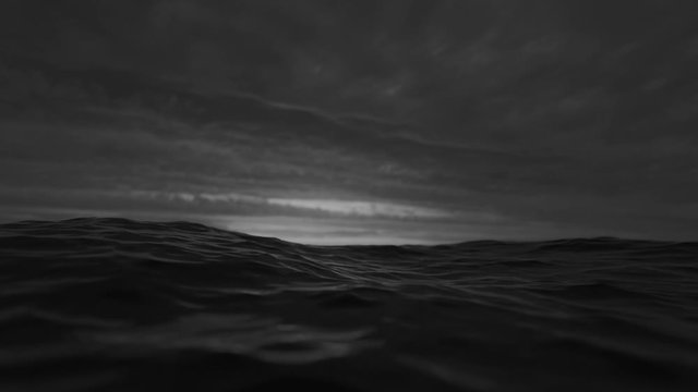 Sea or ocean wave close up, low angle view, slow motion shot. Black and white exotic background