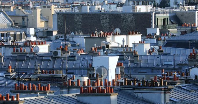 Above The Rooftops Of Paris In France, Detail View With Many Chimney Pots 