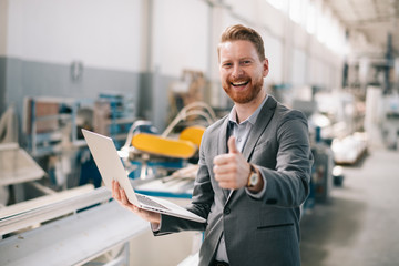 Manager checks machines at the factory. Inspector checks a factory.
