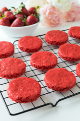 Miniature Red Velvet Cakes with cream cheese frosting and fresh strawberry topping