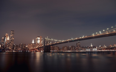 Fototapeta na wymiar Night views of the Brooklyn Bridge from the famed Brooklyn Heights Promenade, Brooklyn, NY, USA