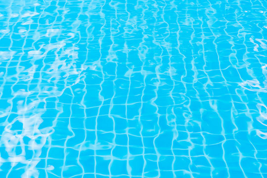 surface of blue water in swimming pool, background of blue water 