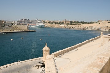 Fototapeta na wymiar Valletta, Malta, August 2019. Grand Harbor from the wall of Fort St. Angelo.