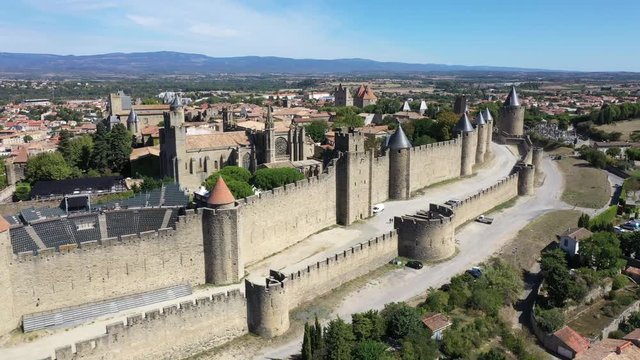 Aerial top view of Carcassonne medieval city and fortress castle from above, Sourthern France