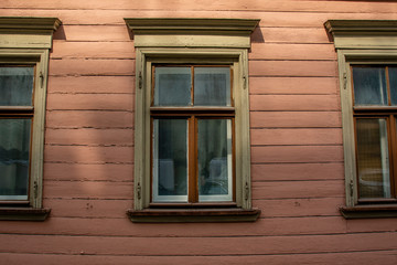 Facade of an old wooden house in the old center of Riga, Latvia, Europe