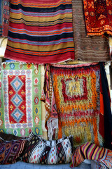  Traditional colorful rugs and carpets are decorated orientally in a carpet store in Cappadocia...