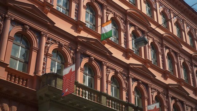 Panning shot of the Irish Embassy with irish flag in Prague, Czech.