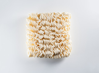 Top View of instant noodles on white background which main ingredient from wheat, close up view