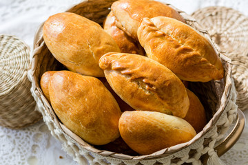 Traditional homemade russian piroshki - a Russian puff pastry stuffed