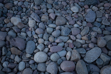 Rock bed pebbles pattern on beach