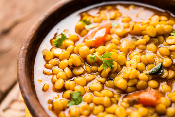 cooked Chana Dal fry or Split Bengal Gram tadka served in a bowl or pan, selective focus