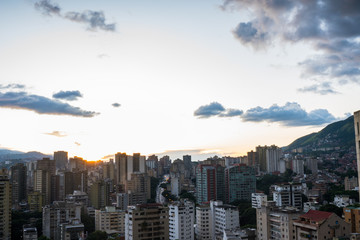 Obraz premium View of Caracas city from west side during a sunset. Venezuela