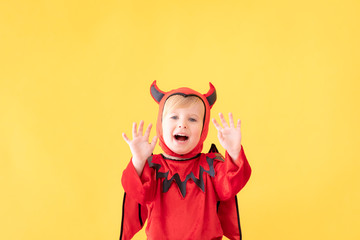 Happy child dressed Halloween costume