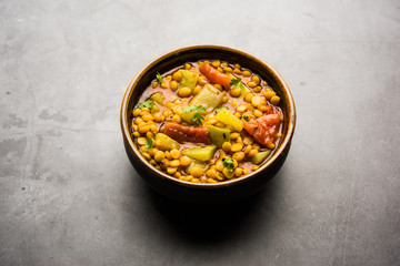 Lauki / Doodhi Chana Dal Subji or Bottlegourd Gram Curry, served in a bowl.selective focus