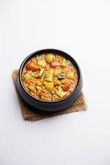 Lauki / Doodhi Chana Dal Subji or Bottlegourd Gram Curry, served in a bowl.selective focus