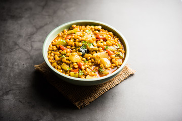 Lauki / Doodhi Chana Dal Subji or Bottlegourd Gram Curry, served in a bowl.selective focus