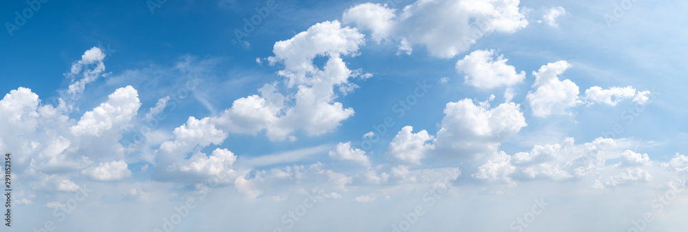 Wall mural blue sky background with tiny clouds. panorama