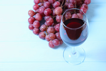 red wine and grapes on the table top view.