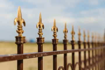 Wrought iron fence with decorative arrows, Decorative wrought iron fence