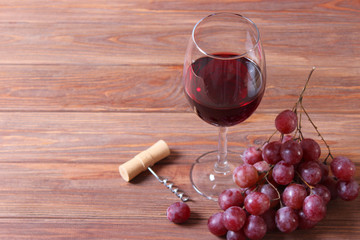 red wine and grapes on the table top view.