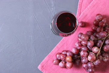 red wine and grapes on the table top view.