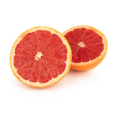 Fresh grapefruit orange / pomelo half cut into two equal parts with a juicy red pulp. Isolated on white background. Side view.