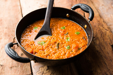 Red Lentil Cooked Dal or Dhal or Masoor daal tadka, selective focus