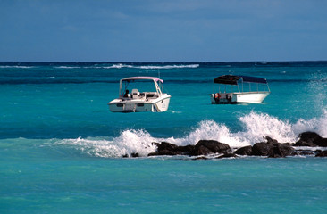 Tropical beach with the boats on Mauritius