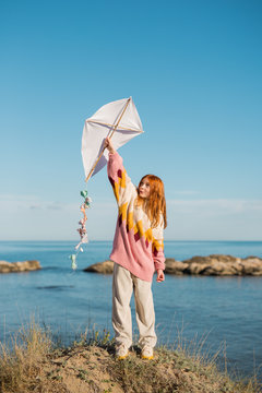 Girl flying a kite