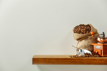 Fresh coffee on wooden shelf and free space for your decoration. 