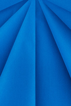 Close up of folded blue origami paper