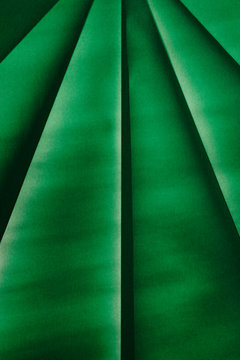 Close up of folded green origami paper