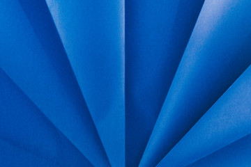 Close up of folded blue origami paper