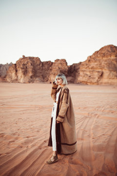 Tourist exploring Jordanian desert Wadi Rum