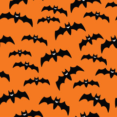 Halloween flying bat. Vampire vector bat. Dark silhouette of bats flying in a flat style. Seamless pattern. Halloween background