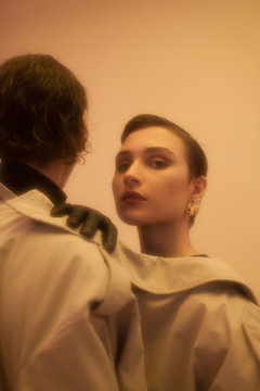 Young couple in one coat