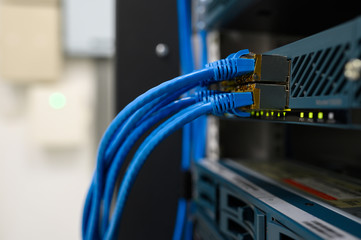 Network device front panel with utp cables connected in data center room