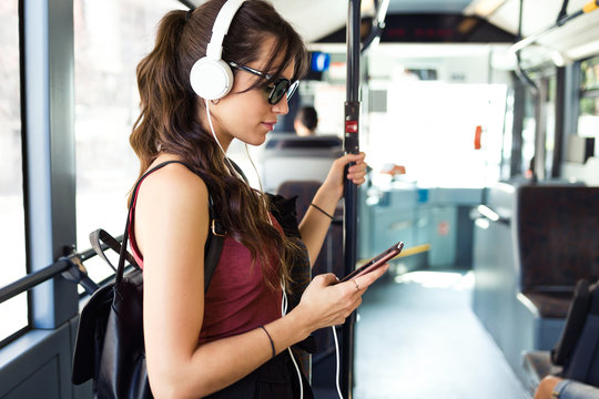 Casual woman riding in bus