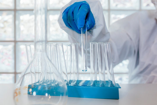 Biologist working with liquid samples in the lab