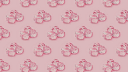 Set of ice cubes on pastel pink solid background. Modern pattern. Minimal pop art. Summer mood. Cold drinks. 