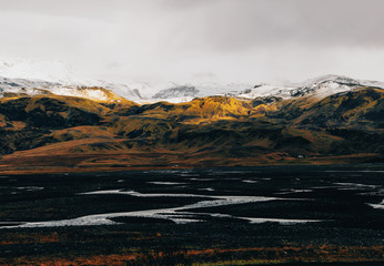 Partial Sunshine on Mountain Landscape in Iceland
