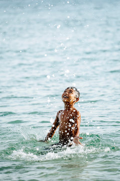 Cute asian kid playing