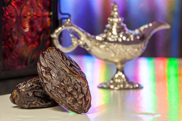 Date fruits Aladdin lamp and arabic lantern.