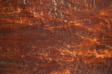 Old brown furniture board as textured wooden background