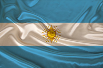 photo of the national flag of Argentina on a luxurious texture of satin, silk with waves, folds and highlights, close-up, copy space, travel concept, economy and state policy, illustration