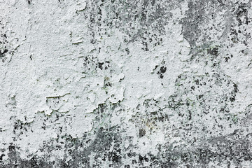 Texture of a concrete wall with cracks and scratches which can be used as a background