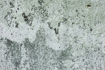 Texture of a concrete wall with cracks and scratches which can be used as a background