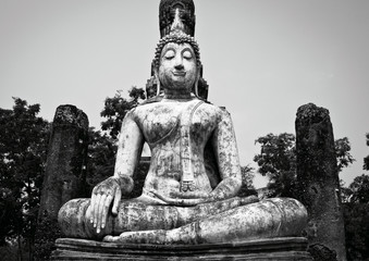 Giant Seated Buddha statue at Sukhothai Historical Park, Northern Thailand