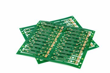 Multiplied printed circuit boards PCB isolated on the white background. PCB assembly.